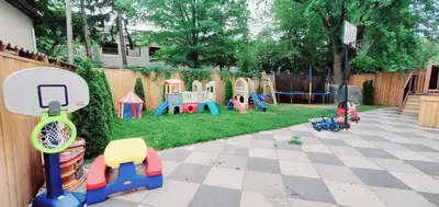 a backyard with a playground with a play equipment at Comfortable Room in Toronto next to Yorkdale mall in Toronto
