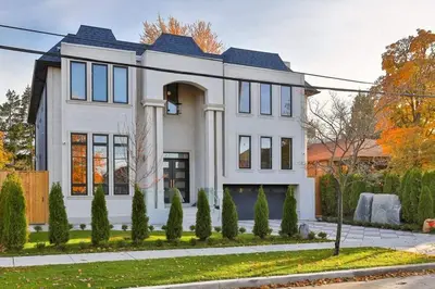 a white house with a lot of windows at Comfortable Room in Toronto next to Yorkdale mall in Toronto