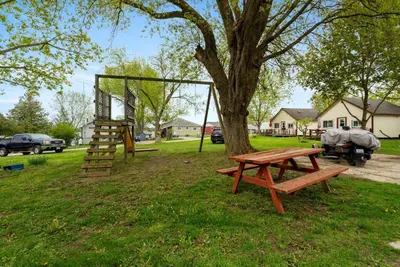 a park with a picnic table and a tree at Dive into Nature at Rice Lake in Bailieboro