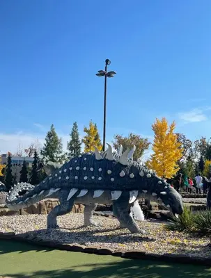 a statue of a turtle in a park at Merritt Place Niagara in St. Catharines