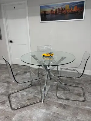 a glass table with a toy car on top of it at Entire 2 Bedroom Apartment in Kitchener in Kitchener