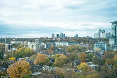 a city with trees and buildings in the background at Yorkville Plaza Express Stay in Toronto