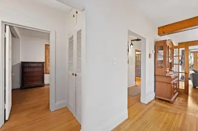 an open hallway with white walls and wood flooring at Picturesque & Serene Gem in Port Credit - Steps to Lake - Backyard in Mississauga