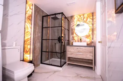 a bathroom with a shower and a toilet at Luxury 2BR Guest Suite in Vaughan