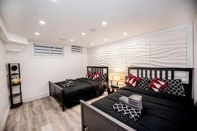 a bedroom with two beds in a room at Luxury 2BR Guest Suite in Vaughan