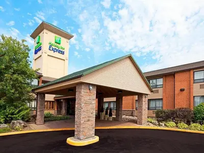 a hotel with a sign on top of a building at Holiday Inn Express Toronto East - Scarborough By IHG in Toronto