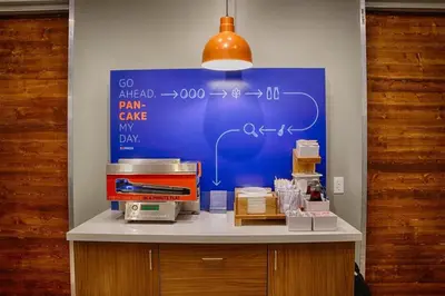 a counter with a blue board with formulas on it at Holiday Inn Express Toronto East - Scarborough By IHG in Toronto