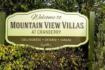 a sign for the mountain view villas at camparity at Mountain View Villas One Bedroom Suite in Collingwood