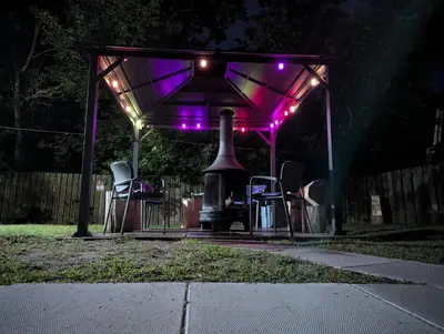 a gazebo with purple lights on it at Tiny Wood Cottage 15 in Wasaga Beach