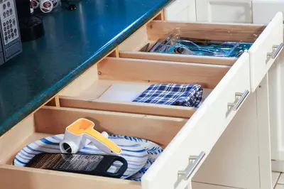 a kitchen drawer with drawers with a kitchen utensils at 1,200sq ft comfy home, perfect location, luxury bedding, feels like home! in Mississauga