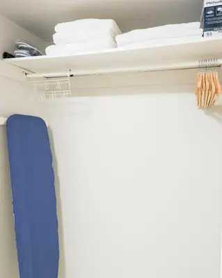a shelf in a room with towels on it at 1,200sq ft comfy home, perfect location, luxury bedding, feels like home! in Mississauga