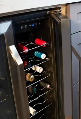 an open oven with bottles of wine in it at L'auberge De France Inn in Belleville
