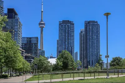 a view of a city with tall buildings at Stylish Condo Downtown Near CN Tower - Free parking in Toronto