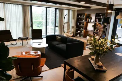 a living room with a couch and a table at 2bhk Luxury brand new pvt suite Kitchener in Kitchener