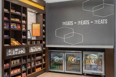 a store with a wall with the words its eats at Hampton Inn & Suites Orangeville, On in Orangeville