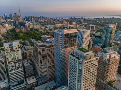 an aerial view of a city with tall buildings at Hazelton Suites - Yorkville - Indoor Pool & Hot Tub in Toronto