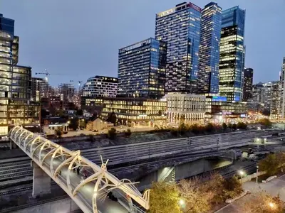 a view of a city with a bridge and buildings at Downtown City View Escape with Free Parking in Toronto