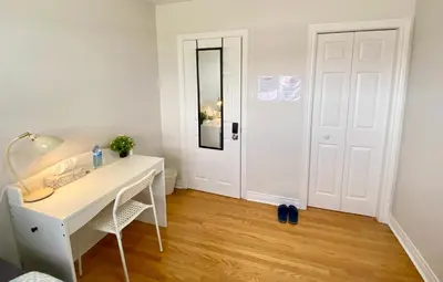 a bathroom with a white desk and a white door at Sunny House - Main Floor, Free parking, in Toronto in Toronto