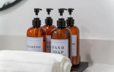 four bottles of hand soap sitting on a counter at Modern 3 Bdr Homeapt Mins To Notlwineriesfalls in St. Catharines