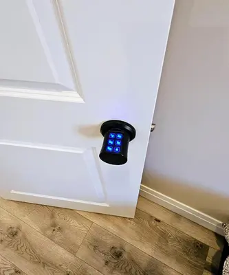 a smart watch on the corner of a door at Redwood Suite in Niagara on the Lake