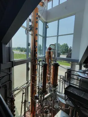 a room with a bunch of pipes and windows at Redwood Suite in Niagara on the Lake