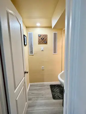 a bathroom with a toilet and a sink at Private Room Near Airport K9 in Mississauga