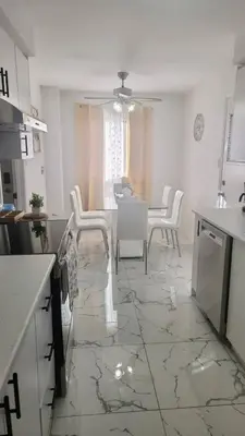 a kitchen and dining room with a table and chairs at Private Room Near Airport K5 in Mississauga