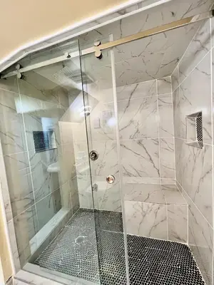 a shower with a glass door in a bathroom at Private Room Near Airport K7 in Mississauga