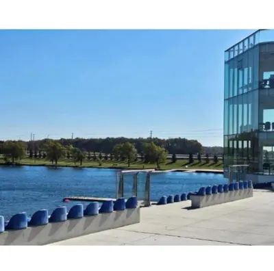 a large glass building next to a body of water at JNShortStay- Niagara Falls Area Hidden Gem in Welland