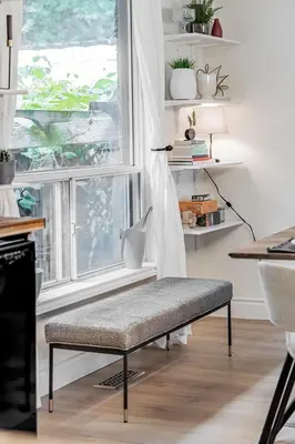 a bench in front of a window in a room at Unique Oasis with Tri-City Access in Mississauga