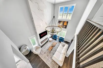 an overhead view of a living room with a chandelier at Lavish Home on Hamilton Mountain in Hamilton