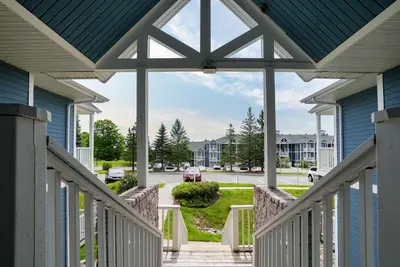 a view from the porch of a house at King Bed, Balcony, Pool, Hot Tub, Sauna in Edgar