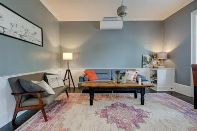 a living room with a couch and a coffee table at Historic Home in the Heart of Elora in Elora