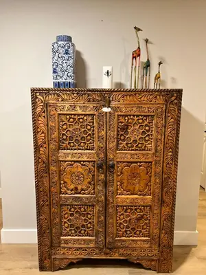 an old wooden cabinet with vases on top of it at Luxurious Private Apartment in Oakville