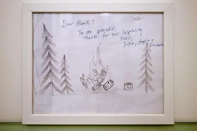 a drawing of pine trees in a white frame at Charming Basement Suite with Private Entrance Near Subway, Koreatown & UofT in Toronto