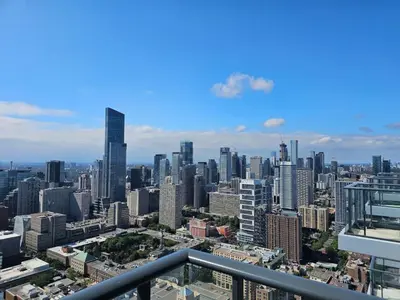 a view of a city from the top of a building at The Cityscape by Instant Suites - PentHouse Unit in Toronto