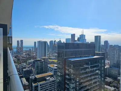 a view of a city from the top of a building at The Cityscape by Instant Suites - PentHouse Unit in Toronto