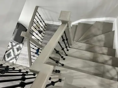 a view of a staircase with a metal railing at Treasure Haven Near Tourism Barrie in Barrie