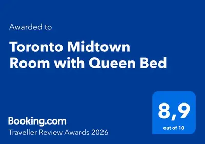 a blue sign that reads toronto midtown room with queen bed at Toronto Midtown Room with Queen Bed in Toronto