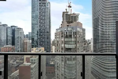 a view of a city skyline with tall buildings at Modern 1BR Condo by Yorkville w Sofa Bed Sleeps 3 in Toronto
