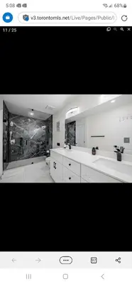 a black and white photo of a kitchen with white counters at Rare 3 Bedroom Luxury Close to Lake in Oakville