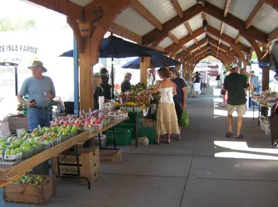 a group of people walking around a farmers market at Charming Farmhouse in the City, Near Wine Country in Belleville