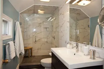 a bathroom with a sink and a toilet and a shower at Gwyn Haven - Spacious Charming Century Home in Wellington in Wellington