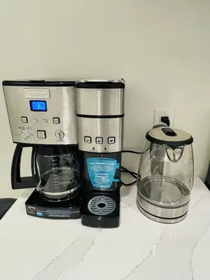 a coffee maker and a blender on a counter at New Cosy bright and Spacious Apartment in East Gwillimbury