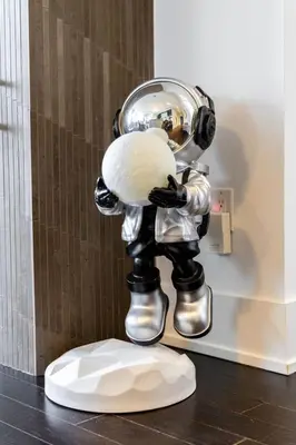 a sculpture of a man in a space suit at PARC LOFT Penthouse with 4bd-WFH-PS5-CN Tower Views in Toronto