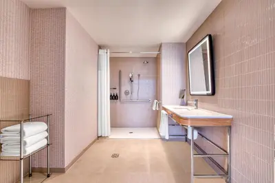 a bathroom with a sink and a shower at Toor Hotel Toronto, Part Of Jdv By Hyatt in Toronto
