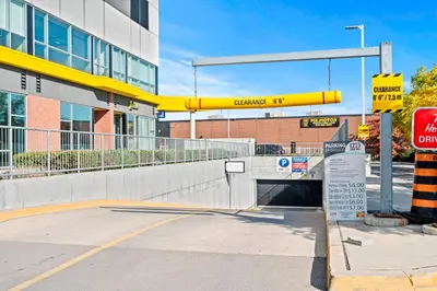 a tunnel in a street in front of a building at Finch West Residence Suites - Hotel DUKE in Toronto