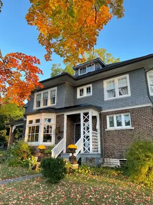 a large house with a brick at The Captain's House heritage bed & breakfast in Midland