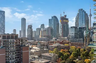 a cityscape of a city with tall buildings at Amazing View 2BR St Lawrence Market Condo, Downtown Toronto in Toronto