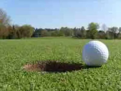 a white golf ball sitting in the middle of a field at Moon River in Campbellford